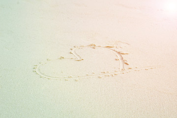 Heart shape on the beach by the sea,concept love day valentine's day