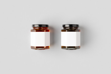 Hexagonal honey jars mockup with blank label. Two different colors.