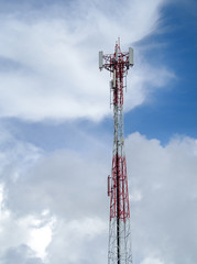 Obraz premium LTE, GSM, 2G, 3G, 4G, 5G tower of cellular communication. Telecommunication tower against the blue sky with clouds.