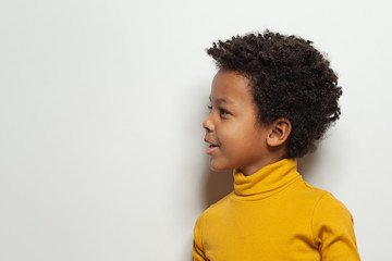 Cute black kid boy, child face profile portrait
