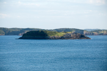 Naklejka premium Grasslands and sea in Iki City, Nagasaki Prefecture, Japan