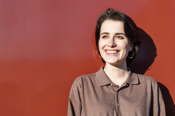 happy young woman with short hair smiling