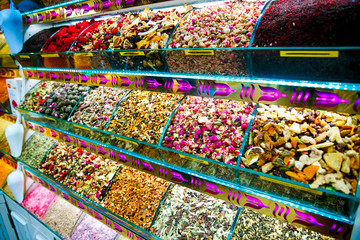Market with different types of tea , herbs, plants and dried flowers