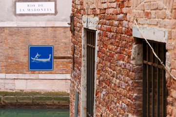 Gondola sign on an ancient wall at Venice, Italy