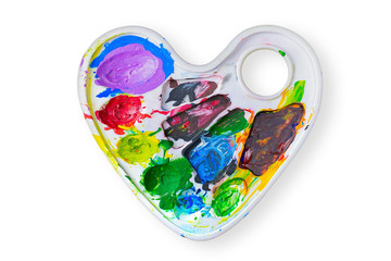 Art palette in shape of heart with paints, isolated on white background