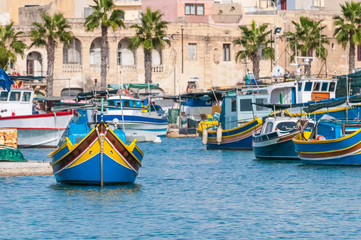 Fototapeta premium Traditional Luzzu boat at Marsaxlokk harbor in Malta.
