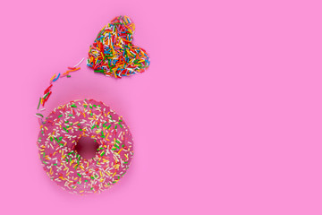 Donuts on a pink background.