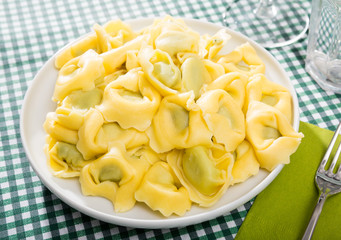 Delicious appetizing tortelloni with ricotta cheese and spinach