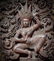 Hindu religion sculpture from stone in historical temple at Thailand