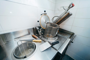 Dirty kitchen with a bread machine on the table