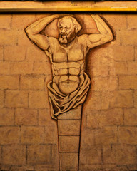 Greek drawing on brick wall