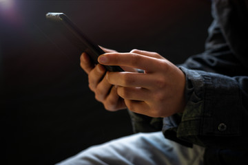 man holding tablet with lens flare , selective focus