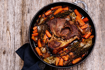 Braised beef brisket big piece with carrots and onion sauce serve in a hot pan - 323974887