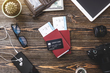 Things for the flight on holiday. Air tickets, passport, phone, credit card. Concept of easy...