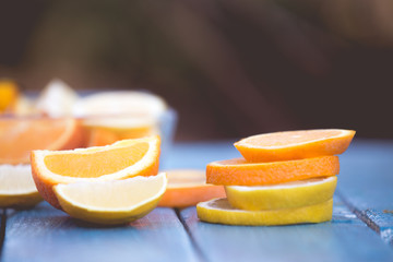 citrus fruits  orange and lemons on blue background