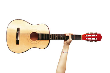 Fototapeta premium Guitar in a hand on a white background. Musical instrument