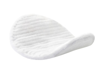 Cotton pad close-up on a white. Isolated