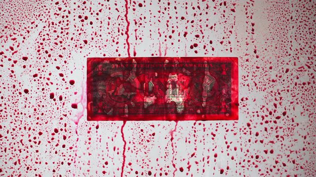 Blood money. The banknote face value of 1 dollar. theme of hired murder and corruption. Behind clear glass covered with red drops