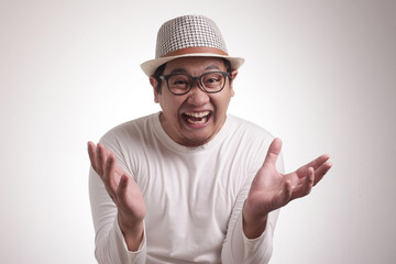 Naklejka premium Funny Asian Man Laughing