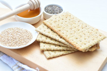 Healthy sesame biscuits (Sesamum indicum) healthy whole grain honey cereal and coffee cup