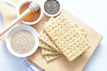 Healthy sesame biscuits (Sesamum indicum) healthy whole grain honey cereal and coffee cup