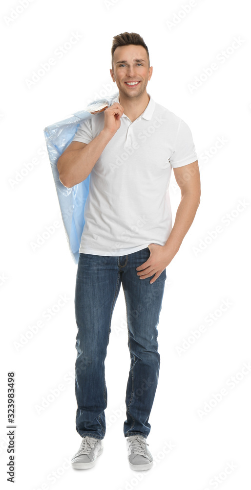 Poster Man holding hanger with shirt in plastic bag on white background. Dry-cleaning service