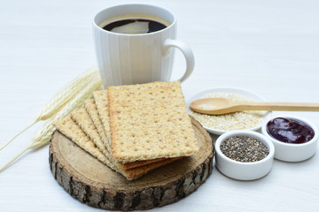 Healthy sesame biscuits (Sesamum indicum) healthy whole grain honey cereal and coffee cup