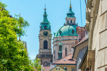 Obraz premium View of the top of old buildings with red roof and blue sky at Prague city Czech republic.