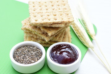 Healthy sesame biscuits (Sesamum indicum), whole grain cereal and jam