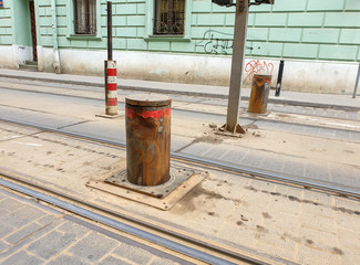 Image of rusty and damaged automatic barrier in city downtoan