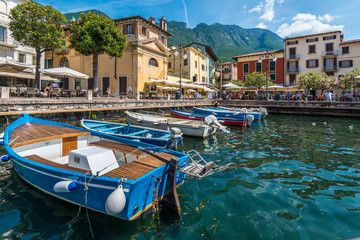 Beautiful peaceful lake Garda, Italy. Malcesine. An Old Town. - obrazy, fototapety, plakaty