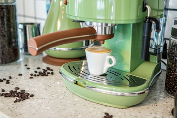 Expresso coffee prepared in green coffee machine