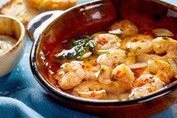 Spicy grilled fresh scampi with garlic and herbs