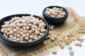 Dried chickpeas (Cicer arietinum) in containers