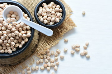 Dried chickpeas (Cicer arietinum) in containers