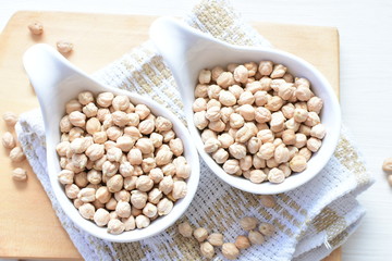 Dried chickpeas (Cicer arietinum) in containers