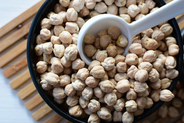 Dried chickpeas (Cicer arietinum) in containers