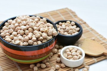Dried chickpeas (Cicer arietinum) in containers