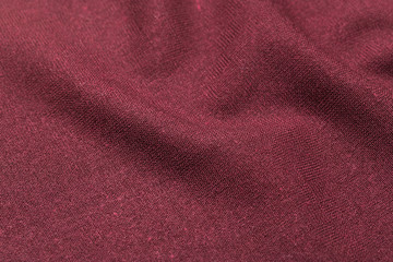 Fototapeta premium burgundy cloth fabric texture. abstract background with soft waves. Wavy lines