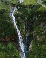 Fototapeta na wymiar Beautiful aerial video Austria waterfall panorama in Alps.
