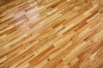 Parquetry, engineered click system oak wood flooring in a freshly renovated room