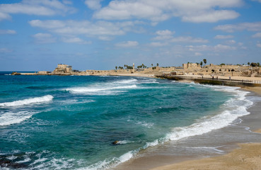 Waves lap the beach at Caesarea in Israel