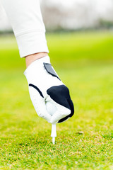 Senior playing golf on a golf course