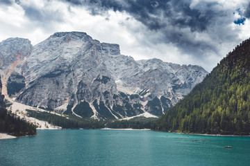 Obraz premium Panoramic view of Lake Braies in the mountains. View from above. Aerial view of Braies lake. Dolomites