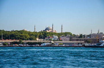 View of the city from the Bosphorus to the mosque of Hagia Sofia in Istanbul, Turkey. Tourist city landscape