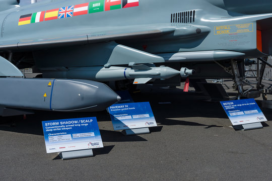 BERLIN, GERMANY - JUNE 03, 2016: Samples of the suspension arms, missiles and aerial bombs of multirole fighter Eurofighter Typhoon. Exhibition ILA Berlin Air Show 2016