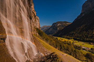 waterfall with a rainbow.
