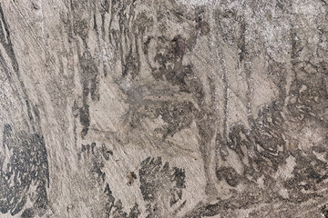 Naklejka premium Dirty, smooth, weathered grey concrete background with stains or splatters. Industrial, grunge, rustic or urban effect. 
