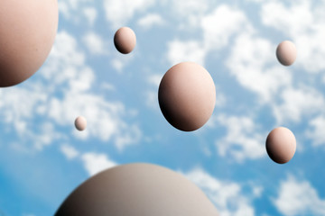 Flying eggs in the sky.  levitation concept - Powered by Adobe