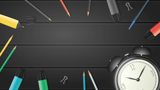 Black boards background. Stationery, markers, highlighters, pencils, pens and an old watch. Background with place for text. 